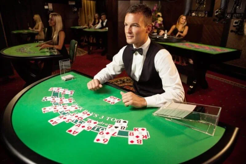 Ruang permainan live dengan meja dan dealer
